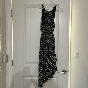 Asymmetrical black poke-dot dress